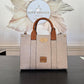 THE "MISCHEL MINI" SATCHEL